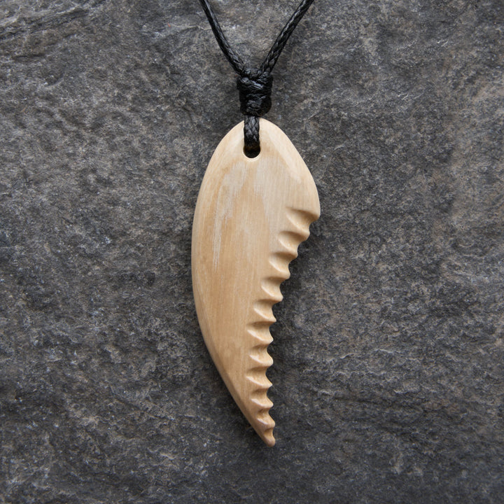 Pendentif en ivoire de mammouth fossilisé